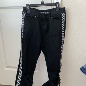 black mom jeans with rips on the knees